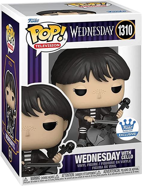 Comes packaged in a window display box. . Wednesday with cello funko